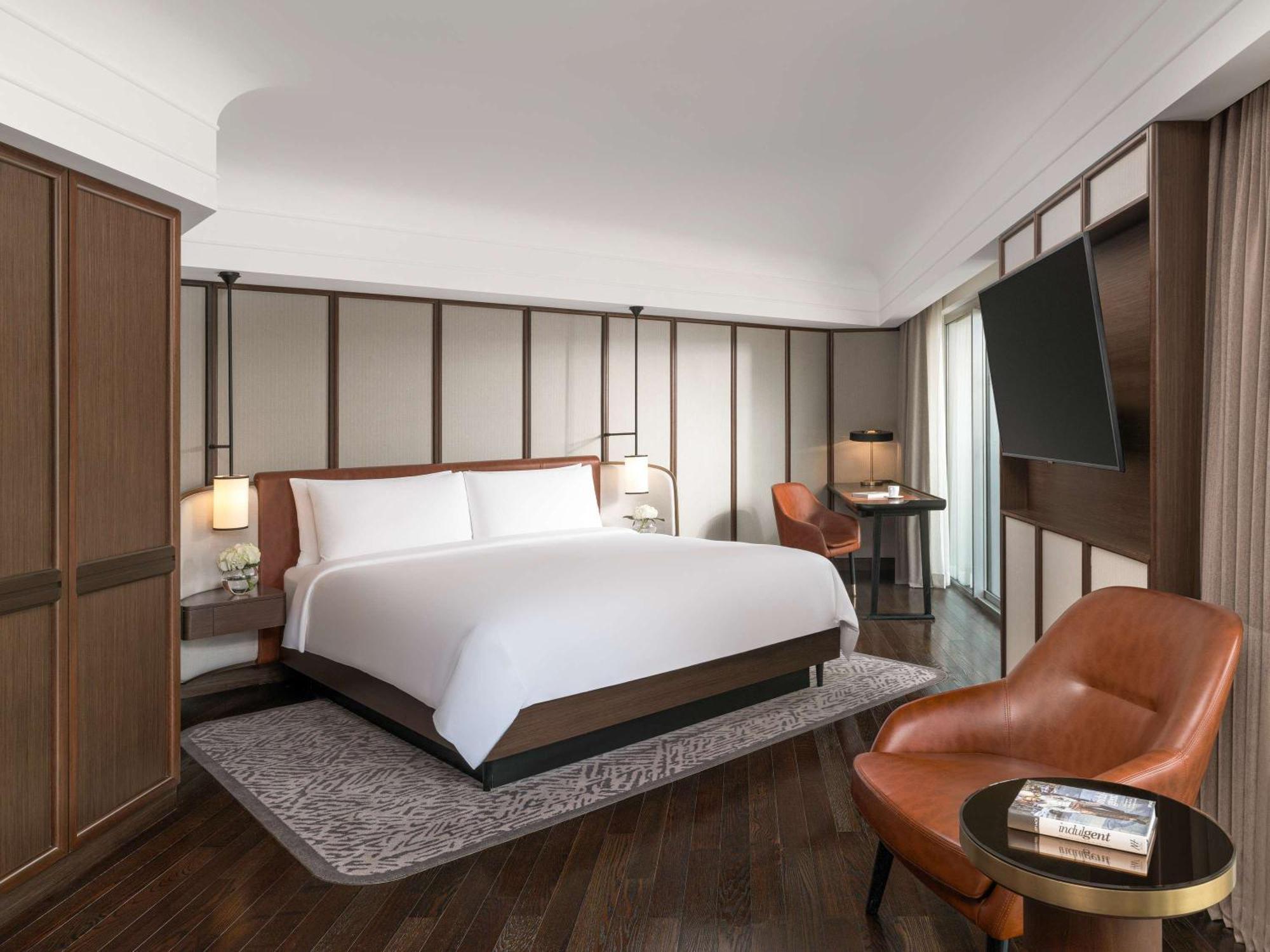 Fairmont Singapore Ξενοδοχείο Εξωτερικό φωτογραφία A bedroom at The Hari