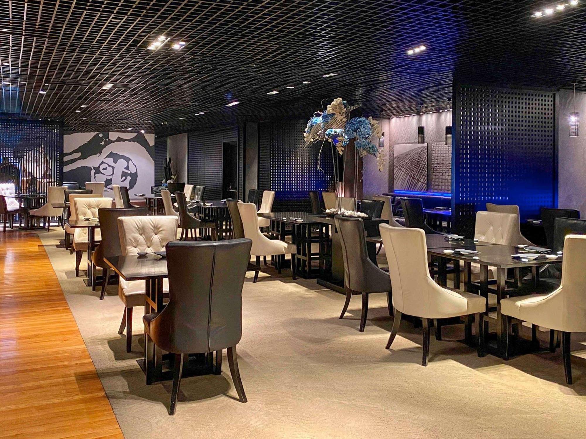 Fairmont Singapore Ξενοδοχείο Εξωτερικό φωτογραφία Interior of a restaurant in Beijing